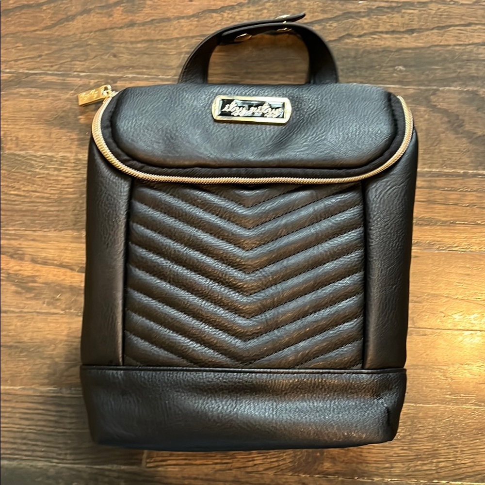 Itzy Ritzy Black Quilted Leather Bottle Bag with Gold Zipper